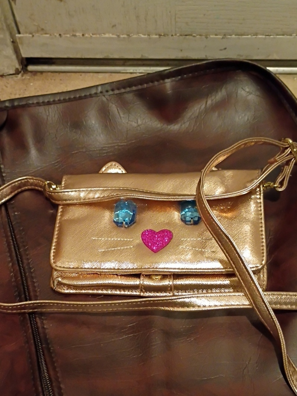 Playful Metallic Gold Crossbody Bag with Gem Accents